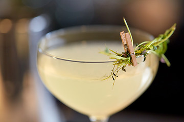 Image showing close up of glass with cocktail at bar