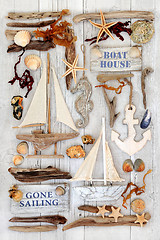 Image showing Decorative Sailing Boats, Signs, Seashells and Driftwood 