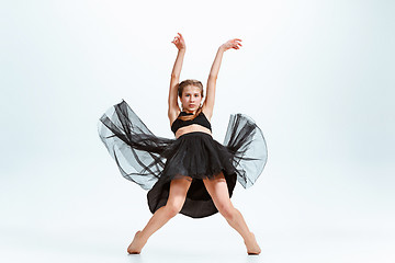 Image showing Young girl break dancing