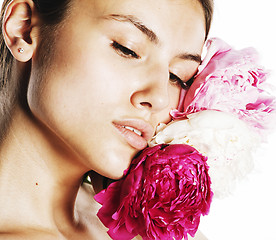 Image showing young beauty woman with flower peony pink closeup makeup soft te
