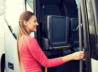 Image showing happy passenger boarding on travel bus