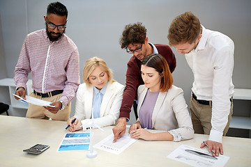 Image showing business people discussing green energy project