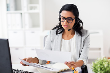 Image showing businesswoman with headset and computer at office