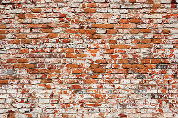 Image showing detail of real textural damaged brick wall