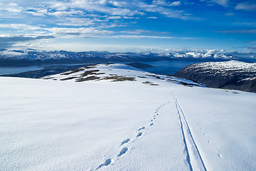 Image showing Downhill with footprints