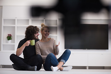 Image showing young couple in their new home