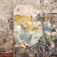 Image showing colorful abandoned brick wall