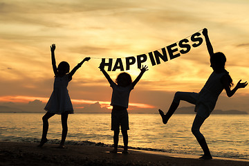 Image showing Happy children playing on the beach