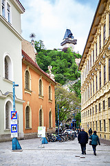 Image showing Old clock tower and street view in Graz, Austria