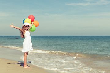 Image showing Teen girl  standing on the beach