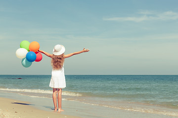 Image showing Teen girl  standing on the beach