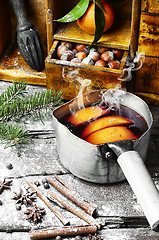 Image showing Hot wine with oranges