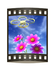 Image showing Drone, quadrocopter, with photo camera against the sky and Beaut