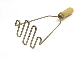 Image showing pestle for preparation of potatoes the kitchen tool on a white background