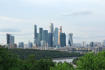 Image showing Modern buildings of glass and steel skyscrapers against the sky