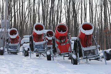 Image showing Snowmaking is the production of snow on ski slopes.