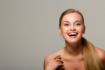 Image showing Smiling woman on gray background