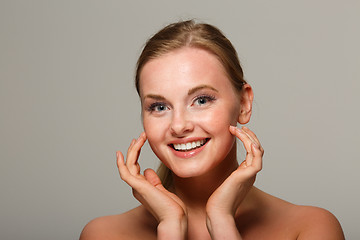 Image showing Smiling woman on gray background