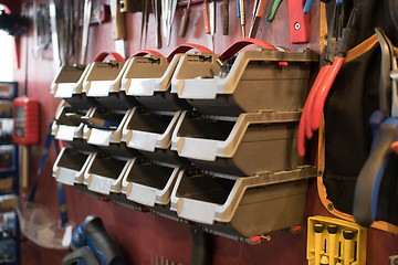 Image showing Variety boxes on wall of garage