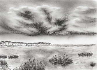 Image showing Sea coastline with cliff and dramatic stormy clouds