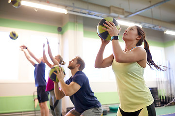 Image showing group of people with medicine ball training in gym