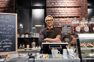 Image showing happy seller man or barman at cafe counter