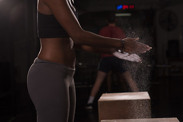 Image showing black woman preparing for climbing workout