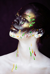 Image showing woman with creative makeup closeup like drops of colors, facepai