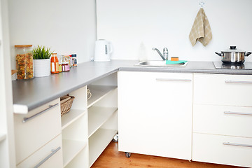 Image showing modern home kitchen interior with food on table