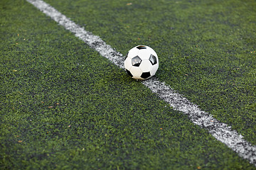 Image showing soccer ball on football field marking line