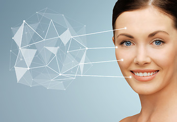 Image showing woman face with low poly projection and pointers