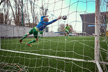 Image showing Soccer football goalkeeper making diving save