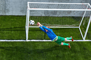 Image showing Soccer football goalkeeper making diving save