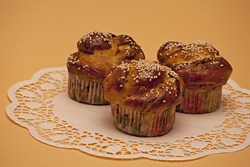 Image showing  Ruddy cakes with sesame seeds on a napkin