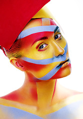 Image showing woman with creative geometry make up, red, yellow, blue closeup 