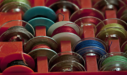 Image showing  Boxes with tailor bobbins