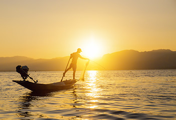 Image showing Fisherman of Lake in action when fishing