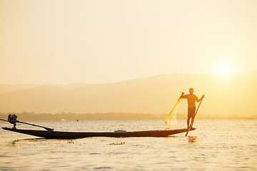 Image showing Fisherman of Lake in action when fishing