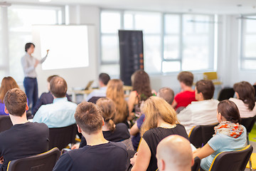 Image showing Woman giving presentation on business conference.