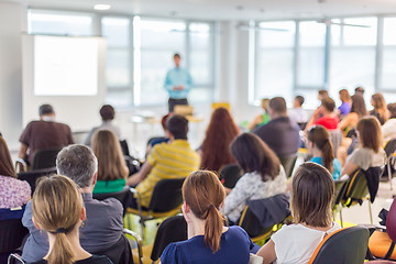 Image showing Speaker giving presentation on business conference.