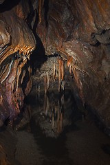 Image showing Underground lake sorrunded by rocks