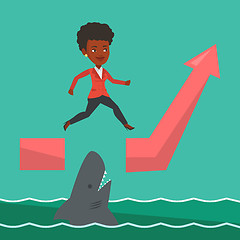 Image showing Business woman jumping over ocean with shark.