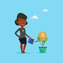 Image showing Business woman watering money flower.