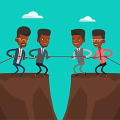 Image showing Two groups of business people pulling rope.