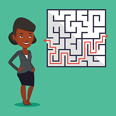 Image showing Business woman looking at labyrinth with solution.