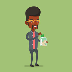 Image showing Businessman putting dollar money into money jar.