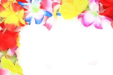 Image showing color plastic hawaii flowers background