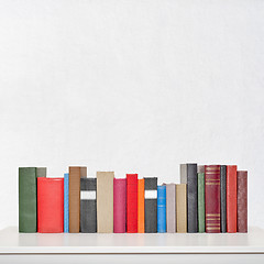 Image showing stack of books on the table