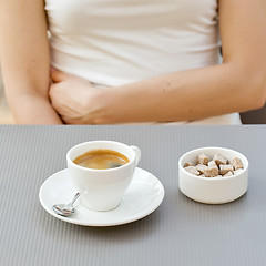 Image showing cup of coffee on a table at the cafe