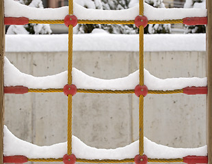 Image showing snow on the climb net rope